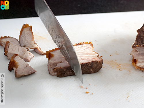 Making crispy roast pork (siu yuk)