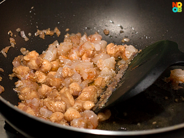 Stirfrying pineapple rice 